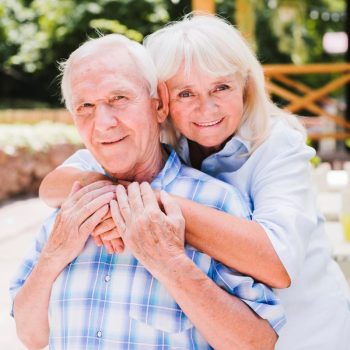 happy-elderly-couple-looking-camera happy-elderly-couple-looking-camera